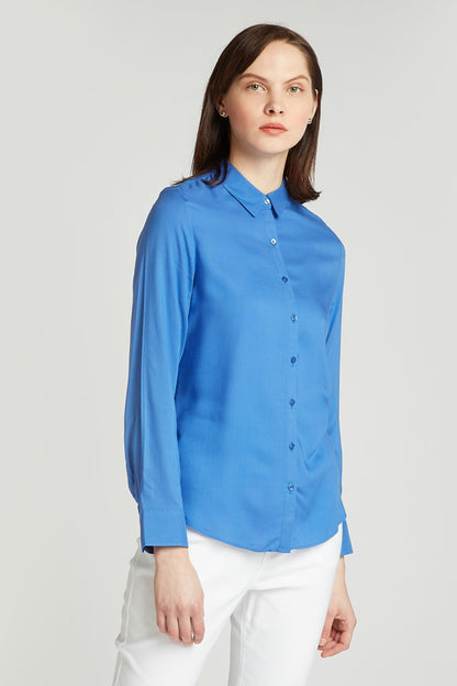 Blue button-up shirt with long sleeves and front buttons