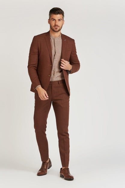 Men's brown suit set with jacket and trousers, styled with crew-neck shirt