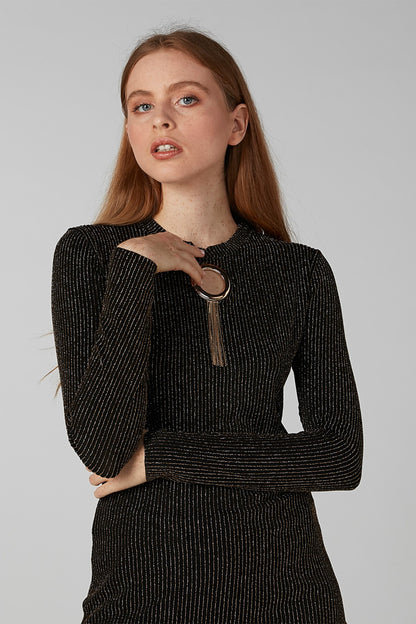 Splash knit top with gold ring accent at neck and slim vertical front trim