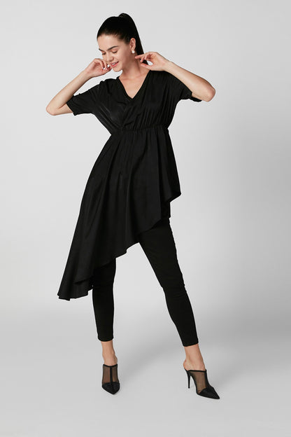Women's black V-neck tunic dress with gathered waist, asymmetrical hem, and leggings