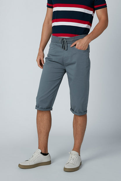 Men's red white navy striped polo and grey knee shorts with drawstring