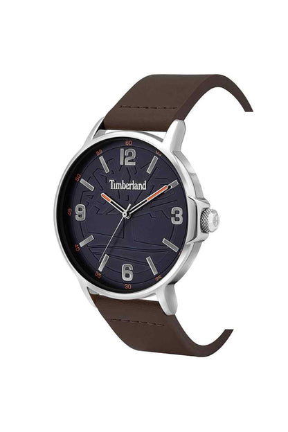 Timberland wristwatch with round silver case, navy dial, and brown leather strap
