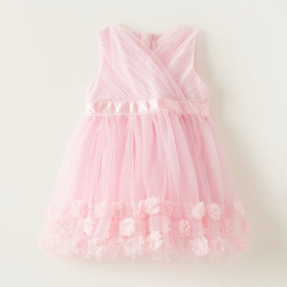 Pink sleeveless baby dress with layered tulle skirt and floral appliques