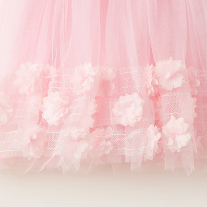 Pink tulle skirt with layered mesh and raised floral appliques