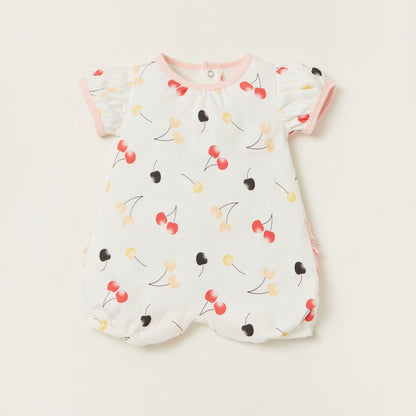 Baby short-sleeve romper with all-over cherry print and pink collar trim
